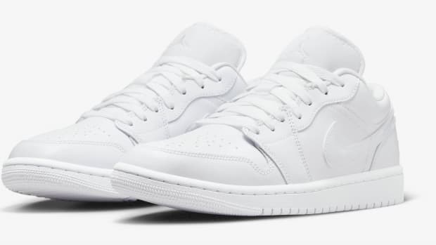 Side view white Air Jordan sneakers.